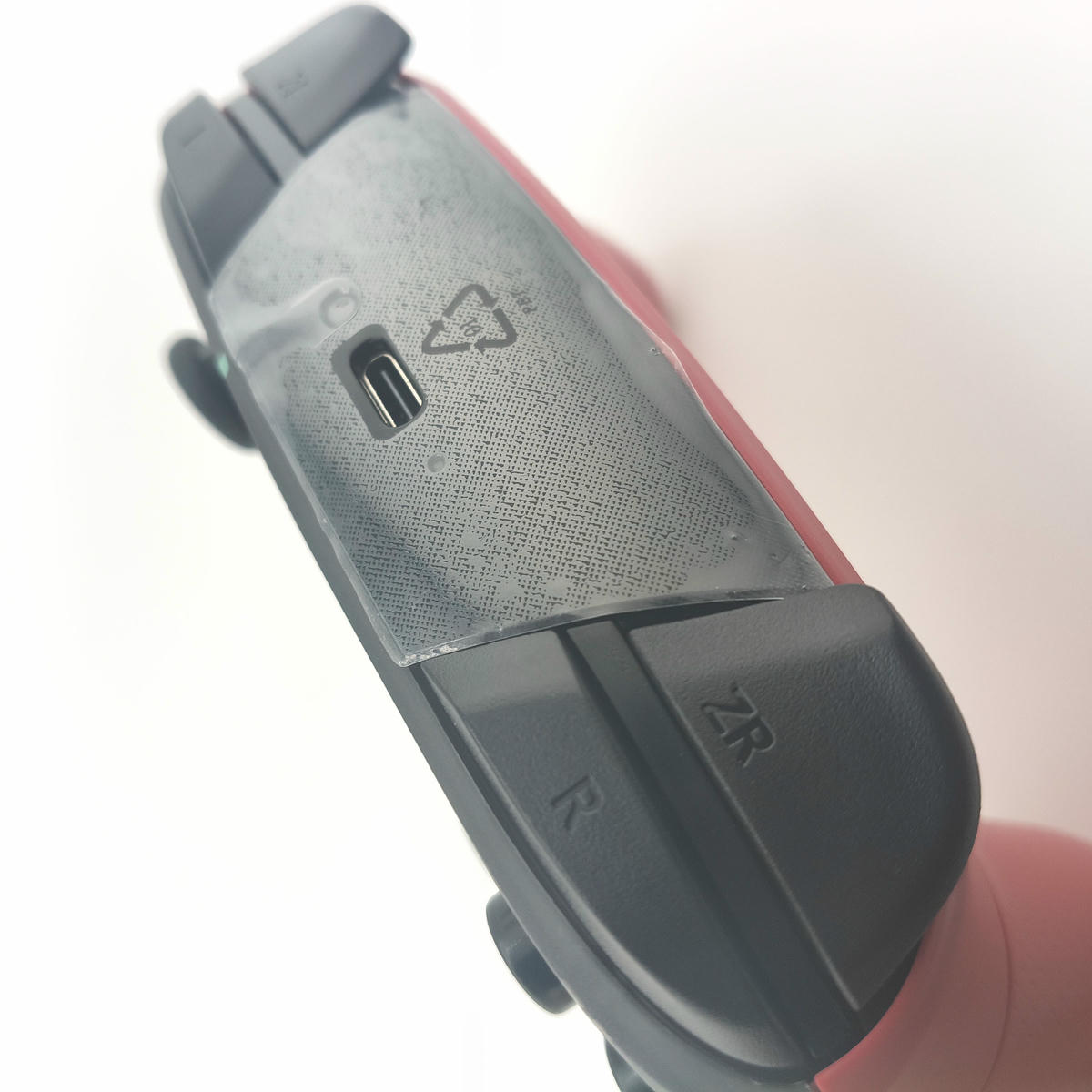 Vista superiore dei grilletti dorsali reattivi del controller Pro Soamide, design bilanciato per un'esperienza di gioco professionale.